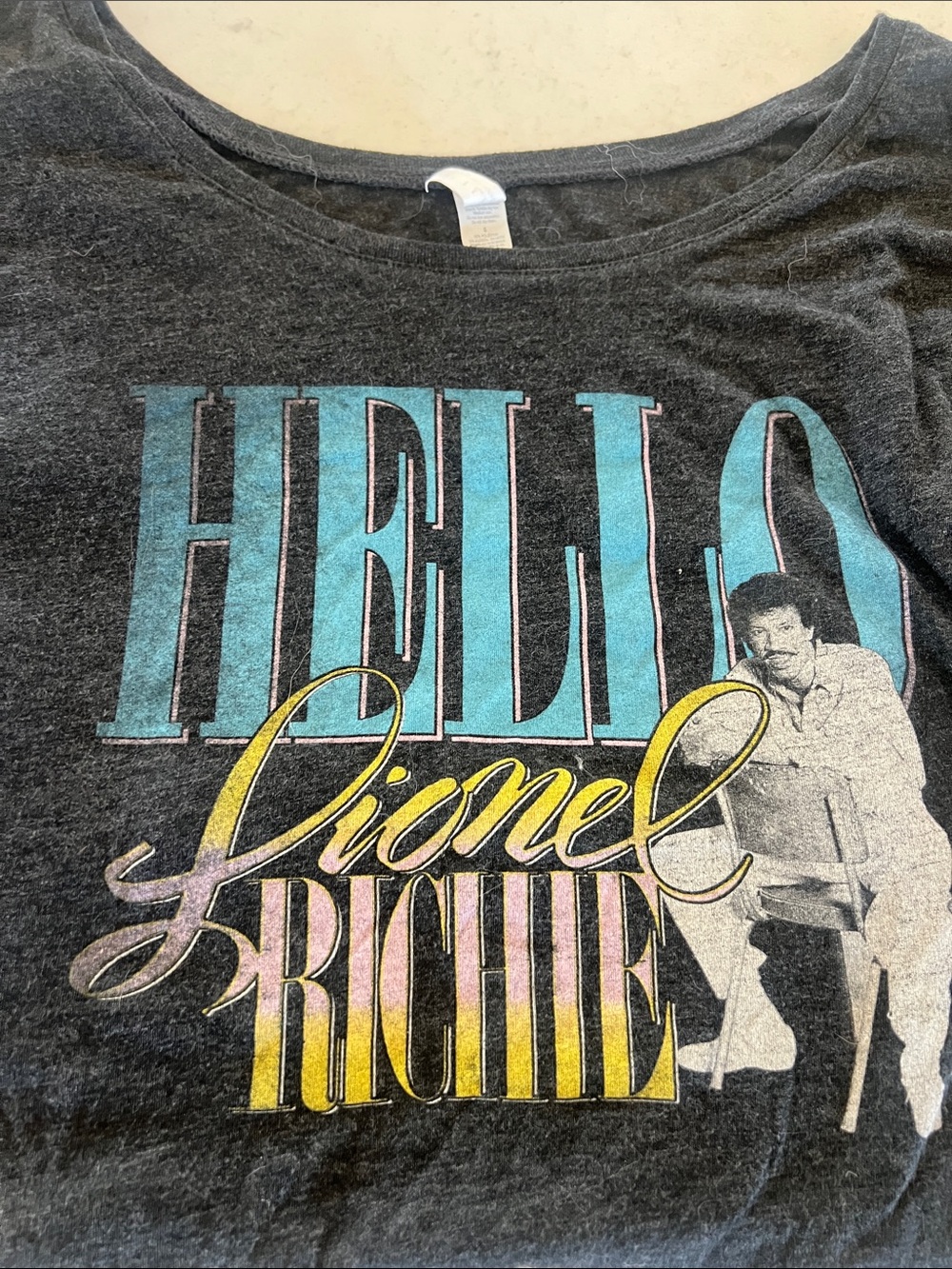 HELLO Lionel Richie off the shoulder t-shirt size large. So cute!